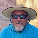 Picture of Michael Gooseff in sunglasses and wide-brim hat.