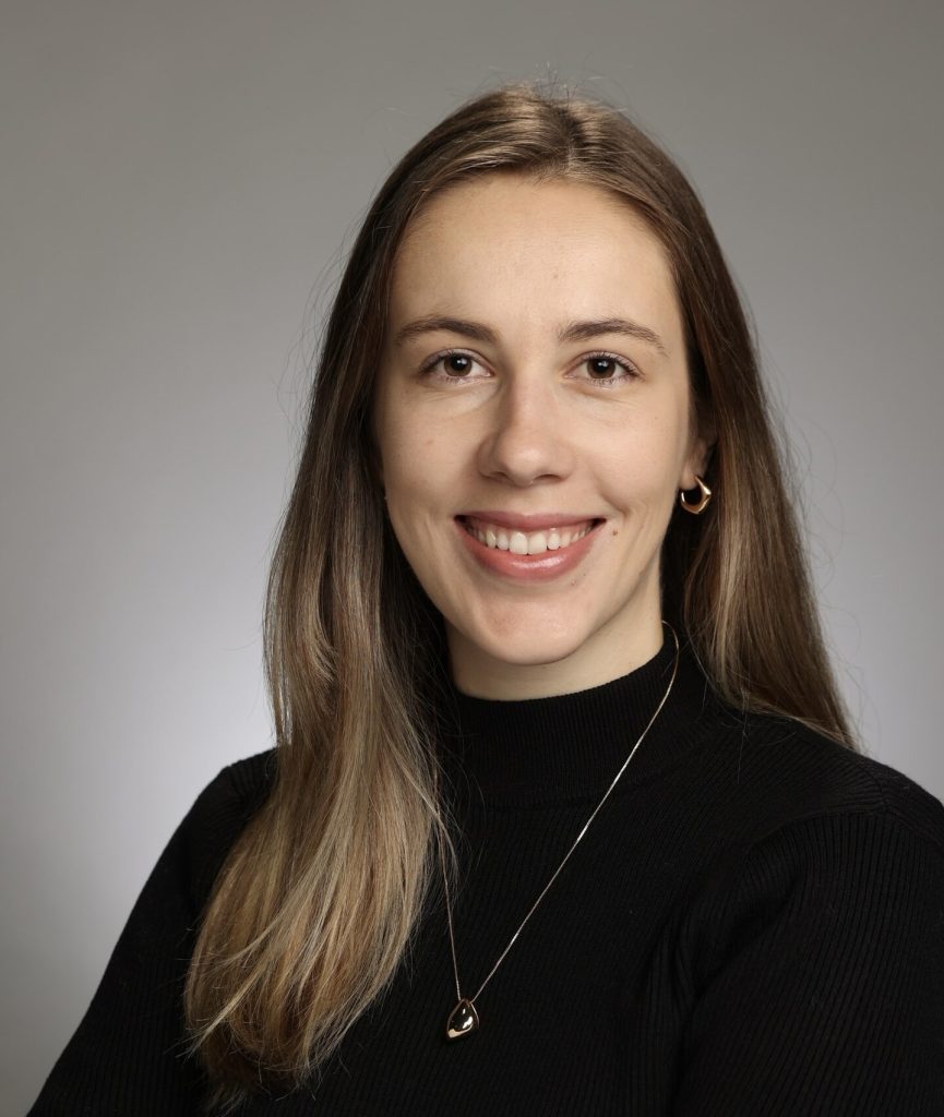 Portrait of woman in black shirt.