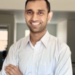 Portrait of Ashwin Dhanasekar in white shirt.