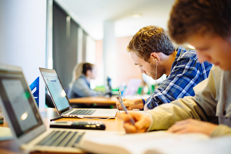 Students studying in front of computers