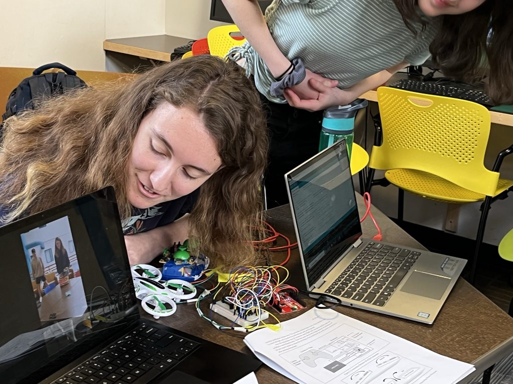 Student looking at project demo