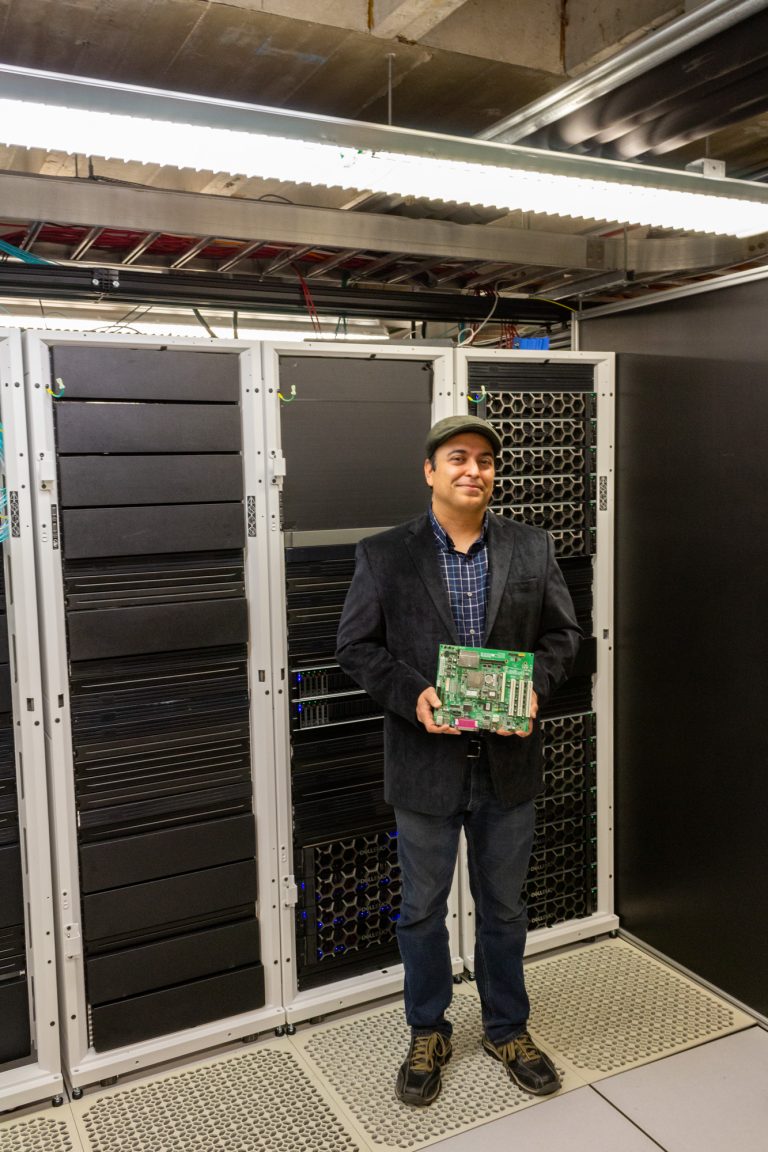 Sudeep Pasricha stands in front of data center
