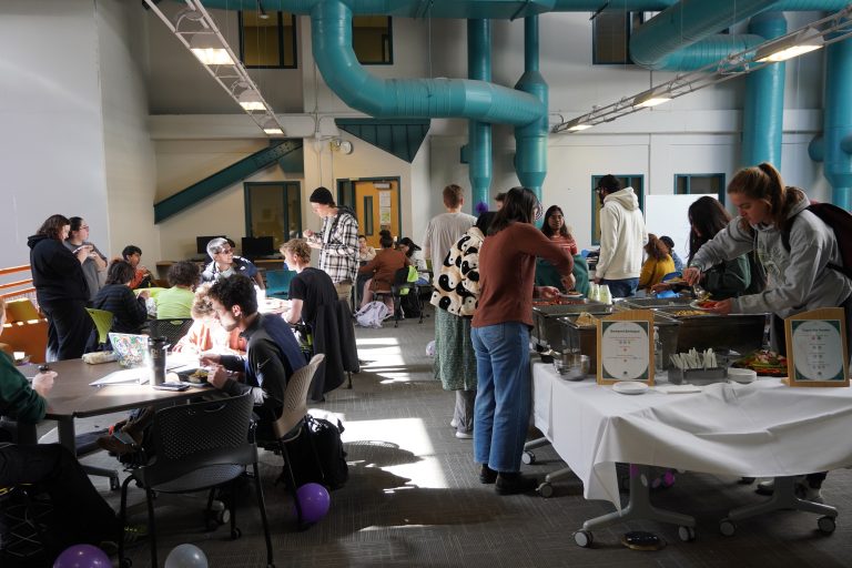 Several students congregate at event