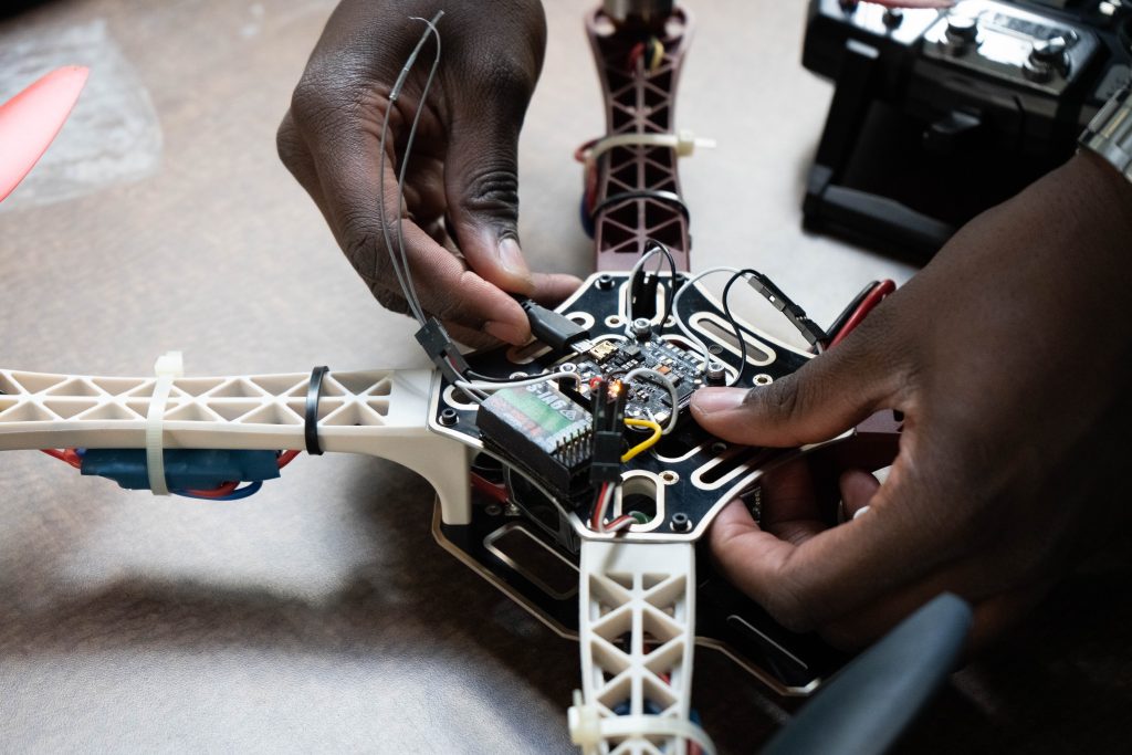Hands fidget with electronic drone