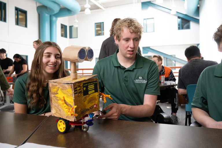 female and male student test robot project