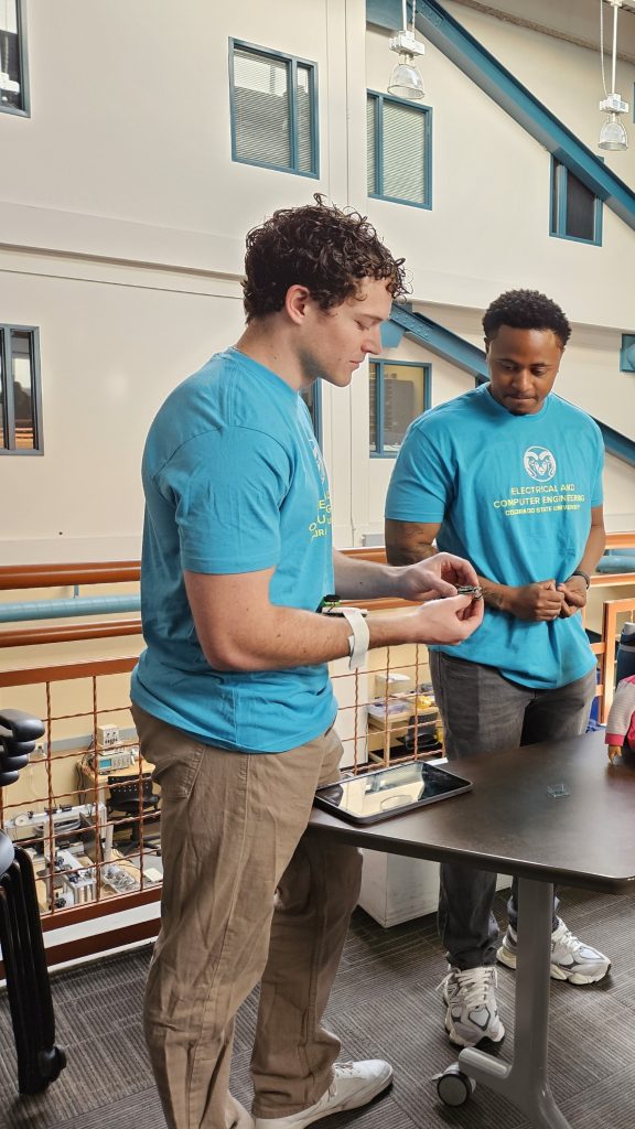 Two men wearing ECE shirts