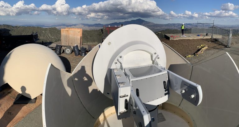 An image of a partially constructed radar sited on an overlook from Rocky Ridge, in the east Bay Area of California