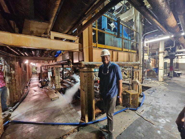 Joshua Oluwatumise visiting a site