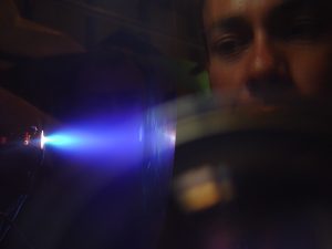 a person measuring as light expands