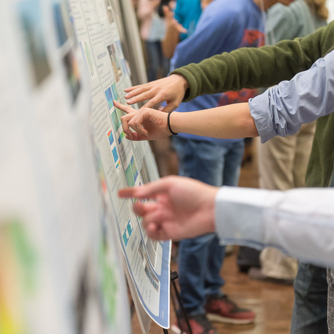 Hands touching a wall