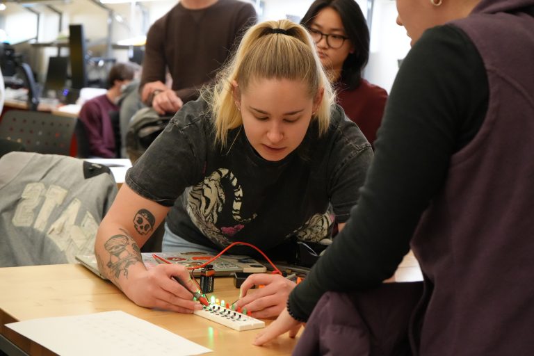A student works on a light project