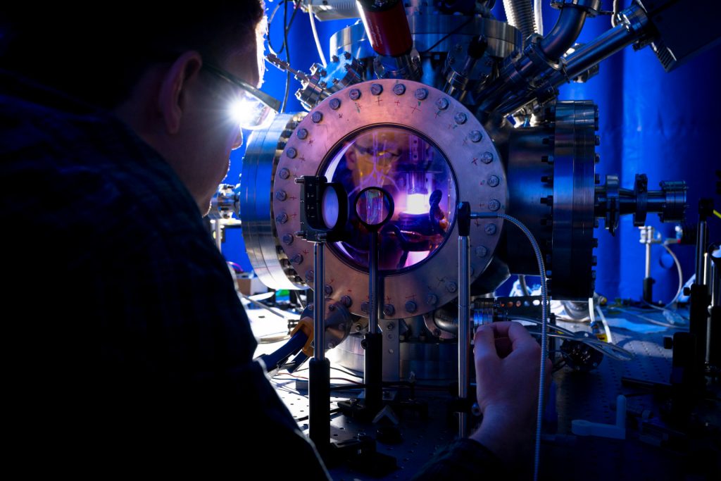 Man tests a laser.