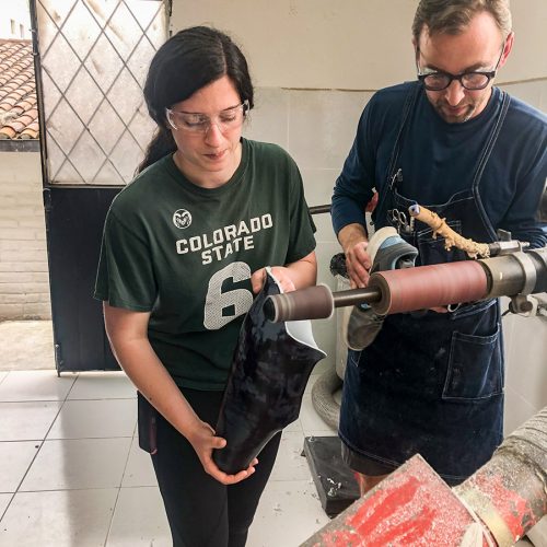 CSU biomedical and mechanical engineering student Brooke Landoch works alongside David Krupa, ROMP co-founder and CEO, to modify a prosthetic device in a clinic in Quito, Ecuador. Photo courtesy Deb Misuraca