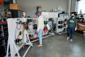 Jeremy Daily, Assistant/Associate Professor-Cyber Security in the department of Systems Engineering in the Walter Scott, Jr. College of Engineering works with graduate students in putting together test platforms for his research at Colorado State University's Powerhouse, December 17, 2020.