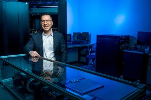 Jim Cale standing in his lab