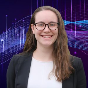 A photo of a smiling woman in glasses.