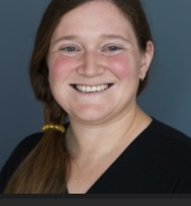 A smiling woman.
