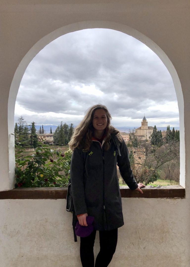 Student poses in the Alhambra