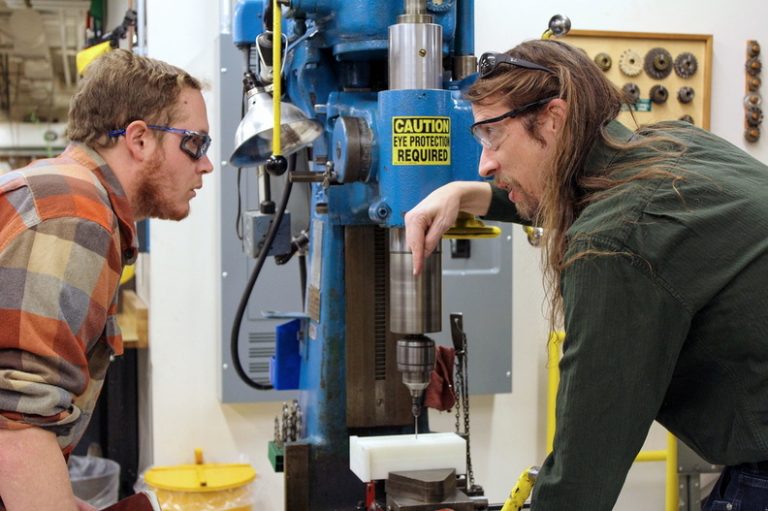 Mechanical Engineering Laboratory Support Engineer Ryan Saunders with undergraduate student, drill press instruction Engineering Manufacturing Education Center teaching laboratory January 2020