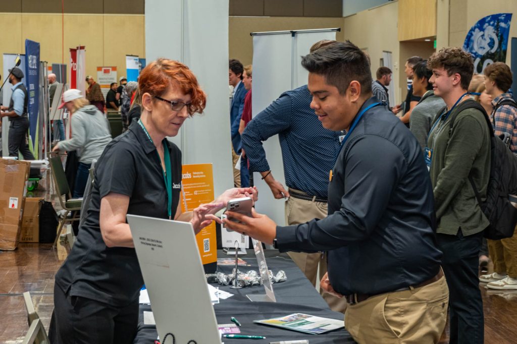Students, alumni, and recruiters interact during the Fall 2023 CSU Engineering Career Fair, October 3, 2023 in the Lory Student Center Ballroom. Credit: Walter Scott, Jr. College of Engineering.