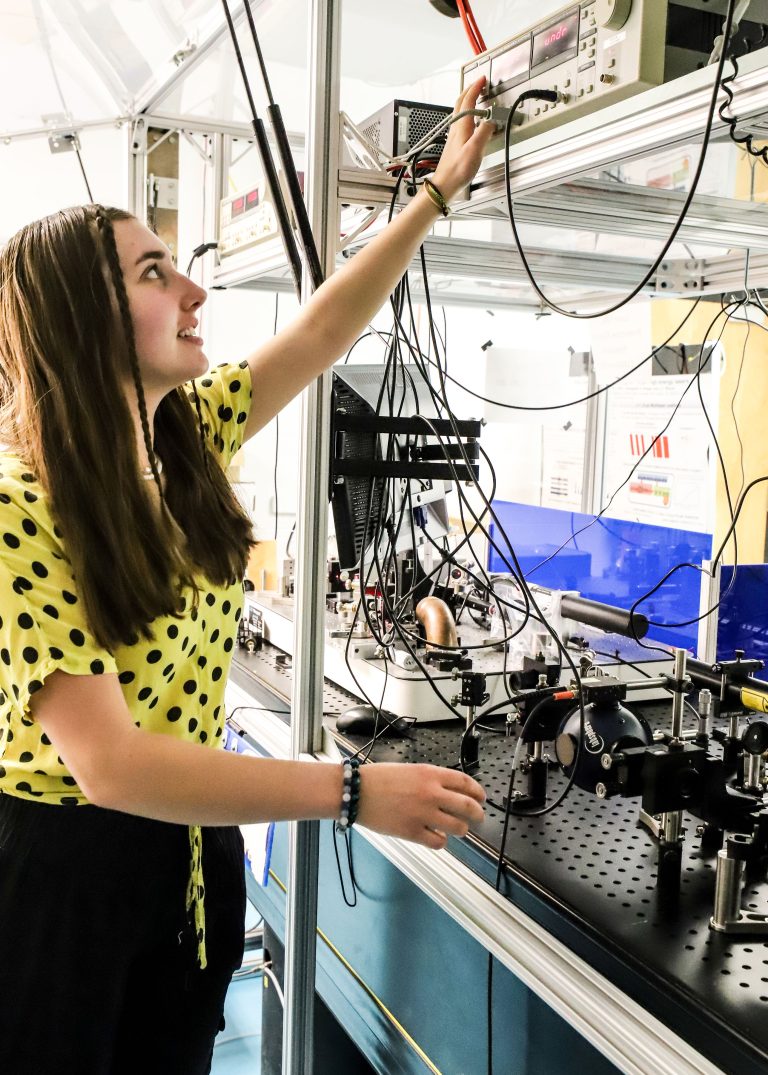 Professor Carmen Menoni and SURE student, Sarah Sadler, an Electrical Engineering major, posing at the Foothills campus by the Engineering Research Center during February 2024.