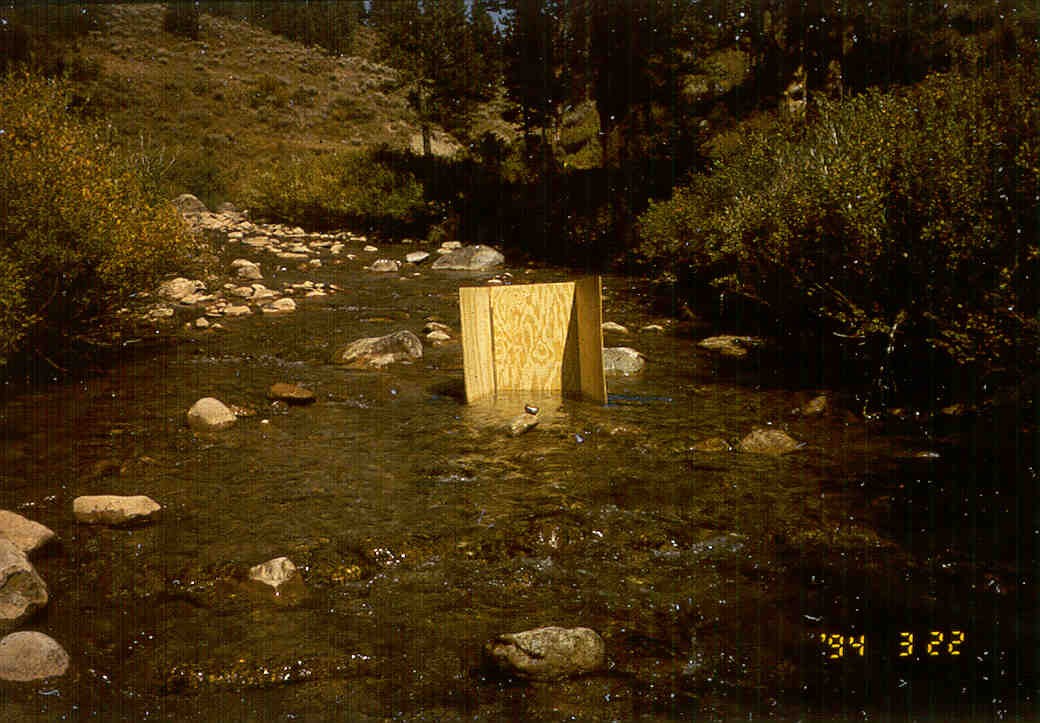 Plywood shield for collecting surface and subsurface bed material samples in Little Granite Creek, WY.