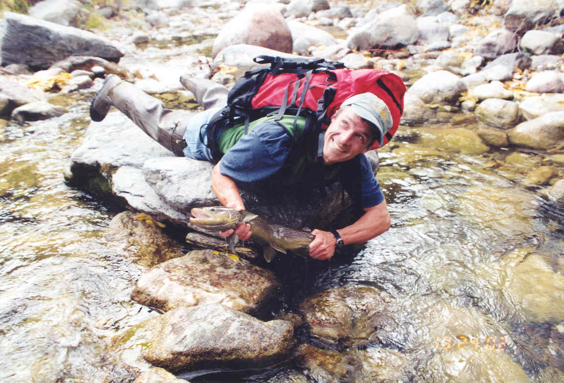 Mark derives a secondary income from his abilities as a trout-herd.
