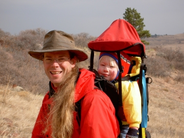 John likes taking his son hiking in the mountains.
